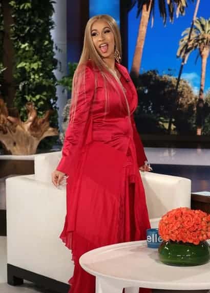 Cardi B in classy red jacket and pants