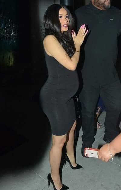 Cardi B in a tight black dress while pregnant