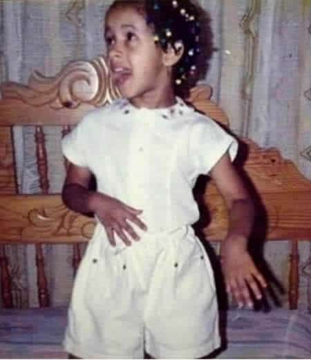 Young Cardi showing off her famous tongue