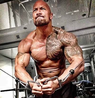 Dwayne Johnson working those muscles
