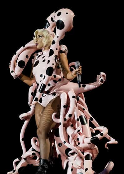 Does she have more or less than 101 dalmatians on that outfit?