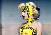 Lady Gaga crazy outfit using police crime scene tape