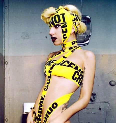 Lady Gaga crazy outfit using police crime scene tape