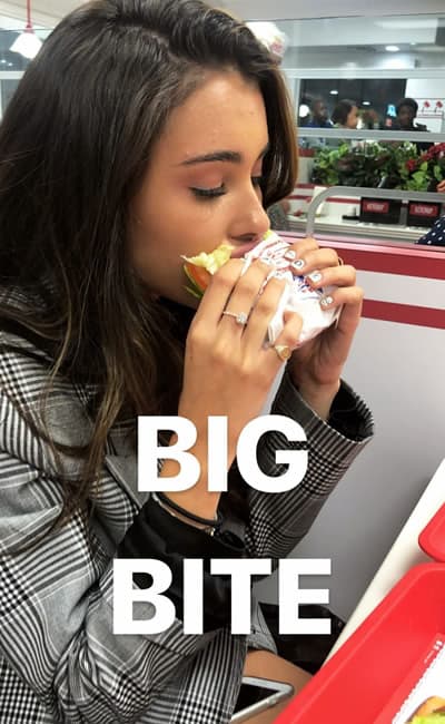 Madison Beer sandwich bite
