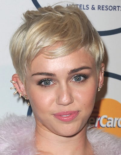Miley Cyrus sporting a low maintenance chic pixie haircut in 2014