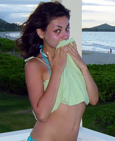 Mila Kunis near the beach