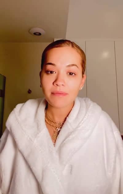 Rita Ora in a bathrobe