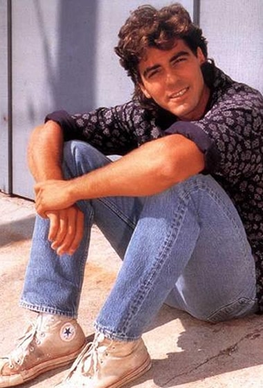 George Clooney with dirty Converse shoes